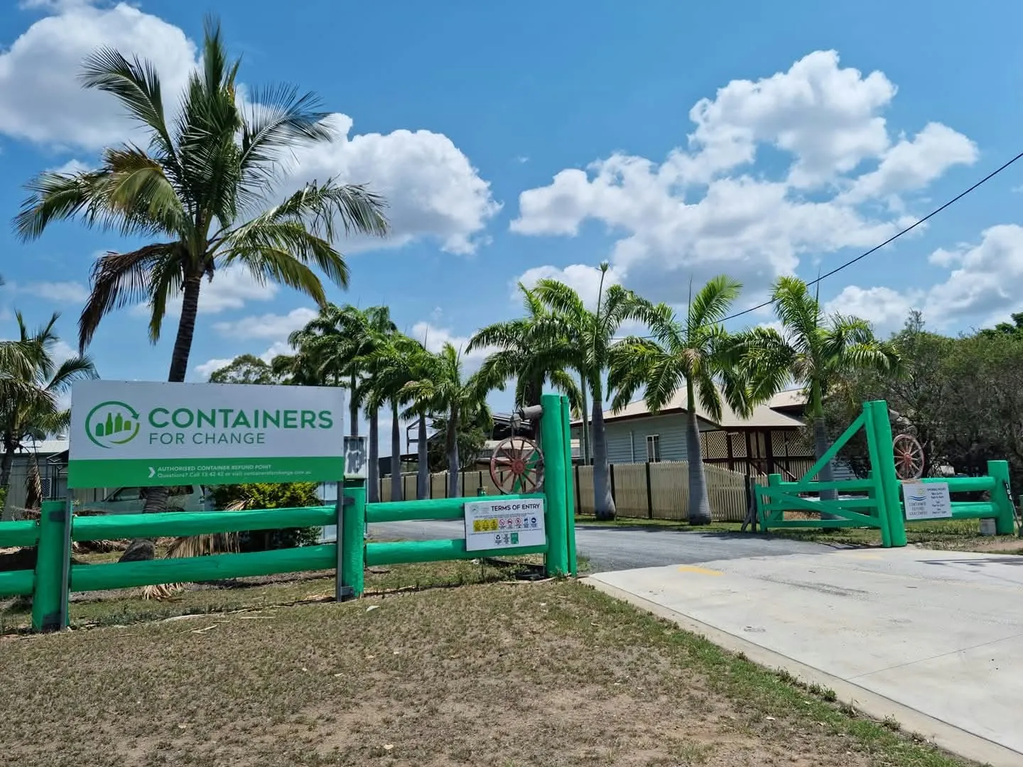 The Gracemere depot entrance on Middle Road, with its Containers for Change sign under the palm trees