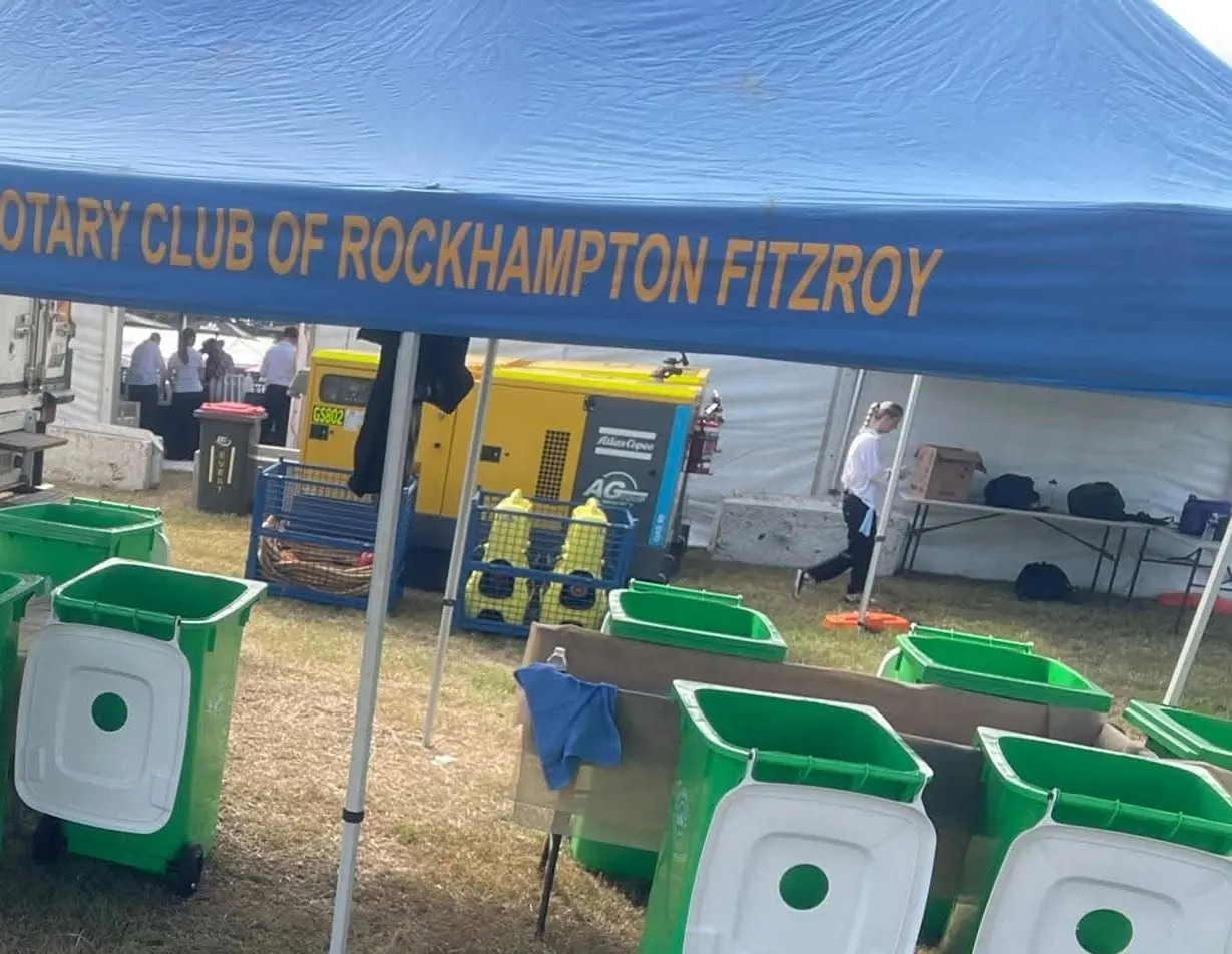 Container Refund collection bins under the Rotary Club of Rockhampton Fitzroy tent at a local event